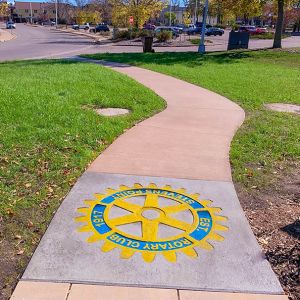 Concrete Walkway with Stamped Rotary Emblem